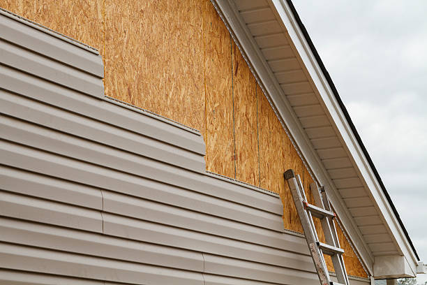 Professional Siding Repair technician working in Fresno, OH